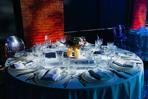 istock Elegant candlelit round table for evening event. 2221561093