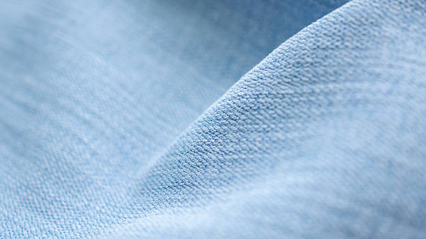 istock Old denim blue jeans fabric texture background close up 2221562872