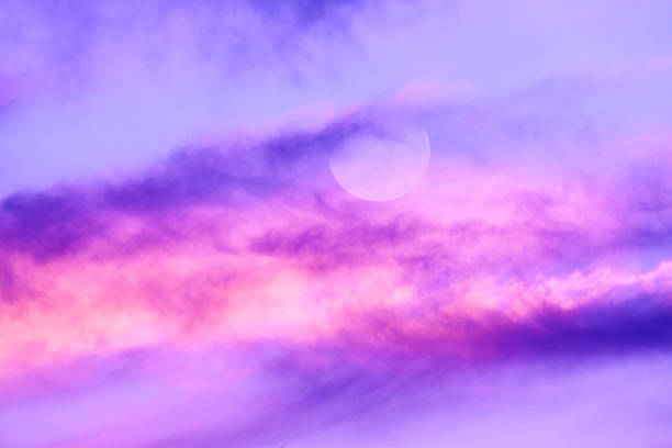 istock Sunset Moon Inspirational Ethereal Surreal Sky Cloudscape Clouds Scenic Sunrise 2221565376