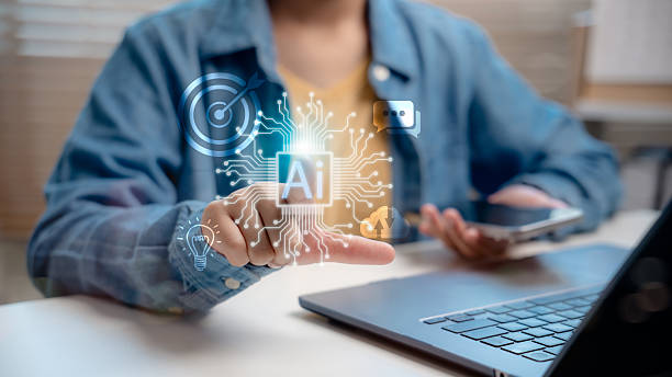 istock Close-up of person interacting with AI digital interface. Concept of artificial intelligence technology, smart automation, data processing, machine learning, and futuristic innovation system. 2221566157