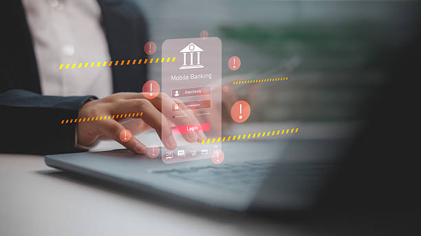 istock Person logging into mobile banking app with warning signs and alert interface. Concept of cybersecurity breach, phishing attack, login risk, identity theft, and online banking security threat. 2221566677