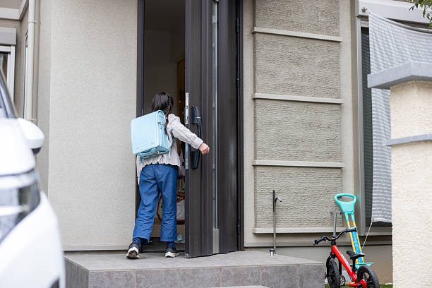 Japanese elementary school student coming back home from school