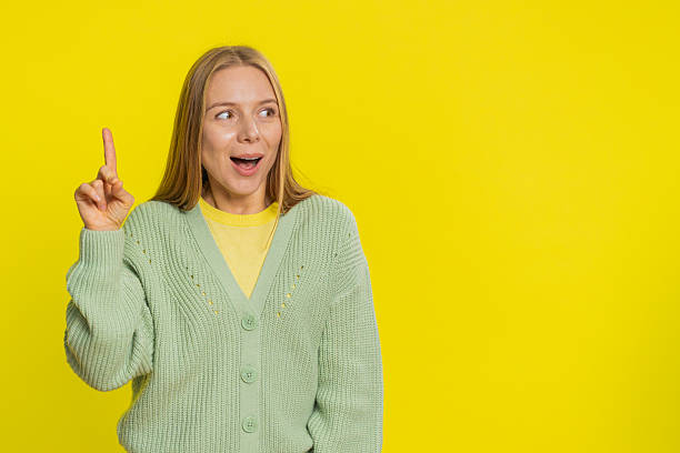 istock Inspired young woman having good idea, plan, startup, showing inspiration motivation Eureka gesture 2221571332