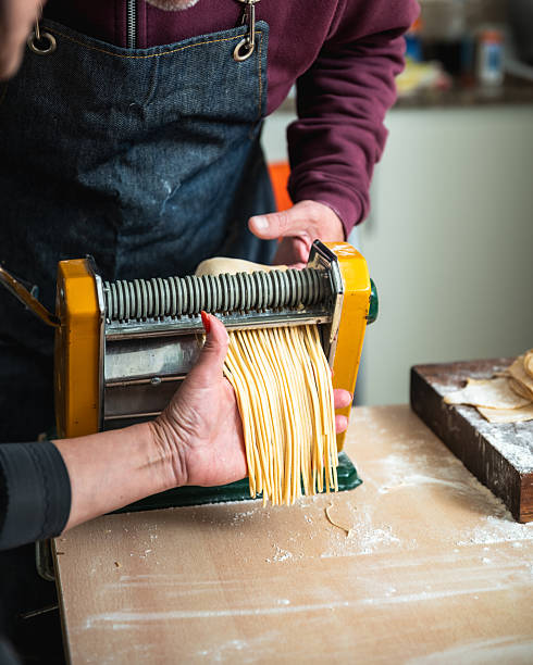 istock making homemade semolina and egg noodles 2221574030