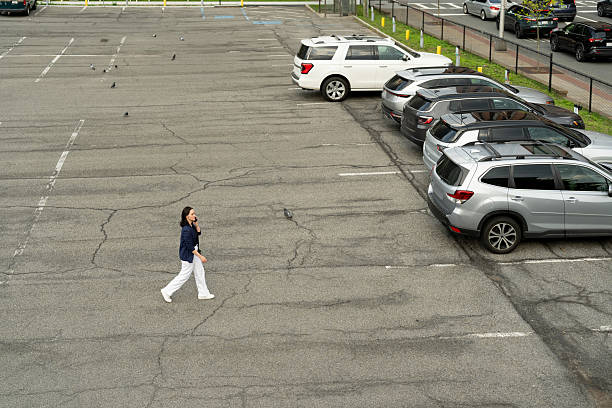 Parking lot at a shopping center showing strong consumerism and retail sales