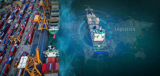 istock Aerial view and top view cargo plane flying above ship port coverage world map import-export business and logistics international goods. Shipping cargo to harbor by crane 2221585936