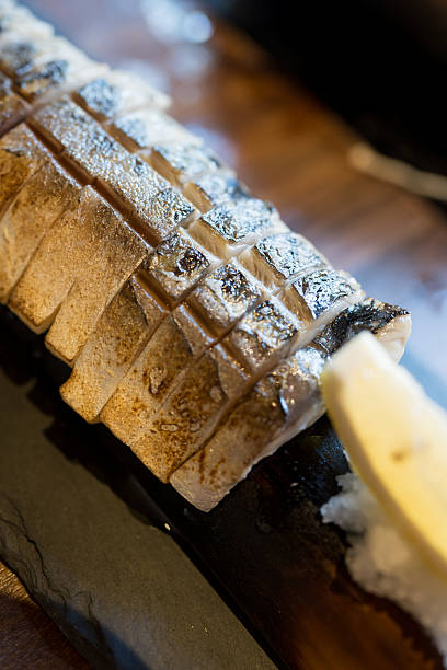 Grilled saba fish with soy sauce and salt with lemon slice