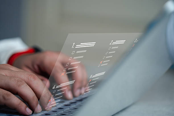 istock Online exam concept, choose correct answer in test. checklist and online testing on laptop. 2221592709