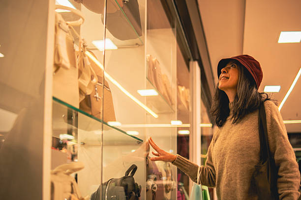 istock Woman looking at store window in Paraguay 2221593405