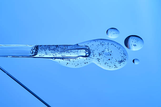 istock Anti-aging wrinkle serum on a blue background. 2221596050