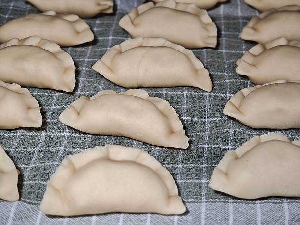 istock Pierogi ruskie with cottage cheese and potatoes on a cloth 2221599408