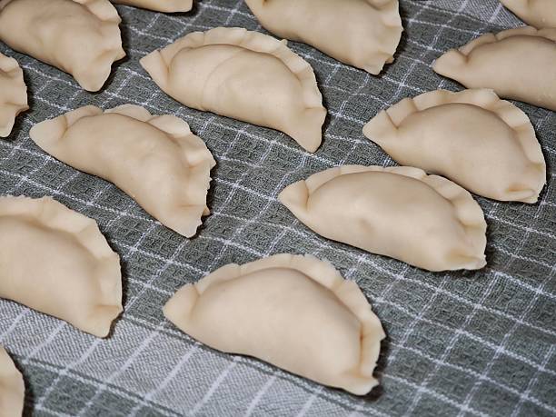 Homemade traditional handmade dumplings closeup isolated