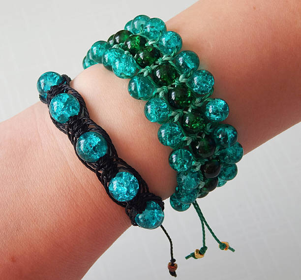 istock Female hand with beautiful bracelets 2221601664