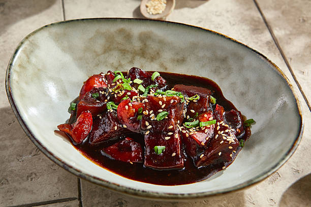 istock Miso-glazed eggplant with sesame and scallion, bright lighting, angled composition japandi bowl 2221609988