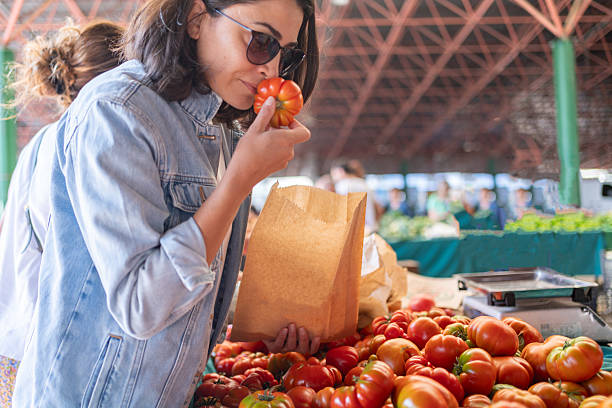 Woman Shopping At Vegetable Marketplace
