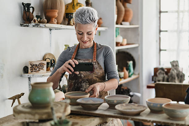istock Beauty female potter creating social media content 2221615866