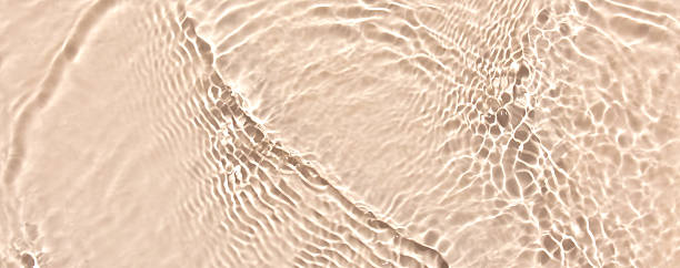 istock water texture ripples wave clean transparent water abstract background in beige color 2221616943