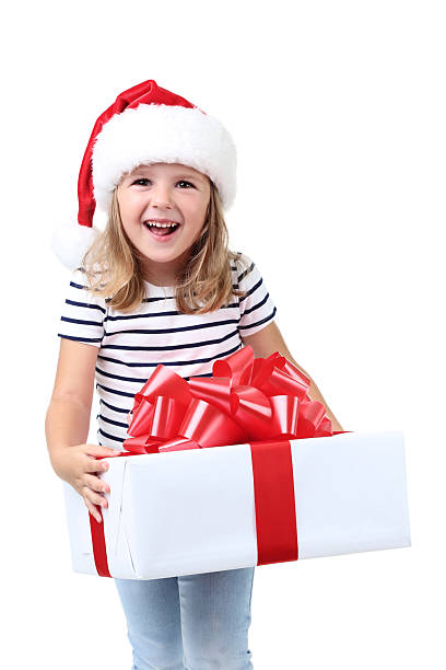 Little girl holding gift box on white background