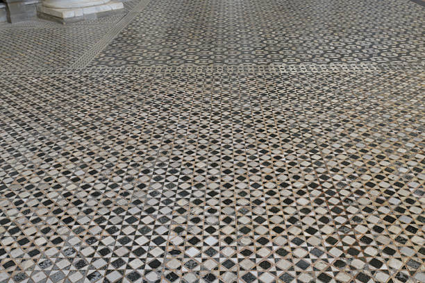 Geometric marble floor pattern in the Florence Baptistery, featuring medieval stone inlay technique, Florence, Italy.