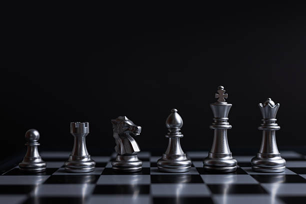 istock white chess pieces arranged on a chessboard, creating a visually appealing and strategic composition 2221628860