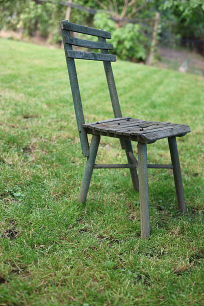 istock Old dilapidated garden chair 2221633729