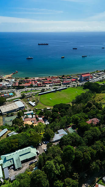 Football stadium, national hospital and Honiara harbour. stock photo