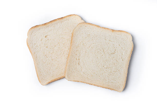 istock Slice of White Bread on White Background 2221635621