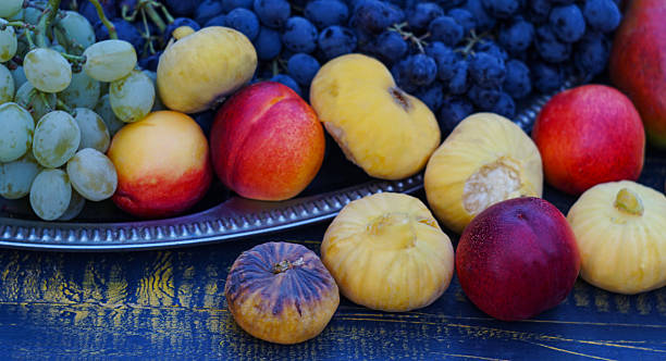 istock Grapes and various fruits on the board 2221638199