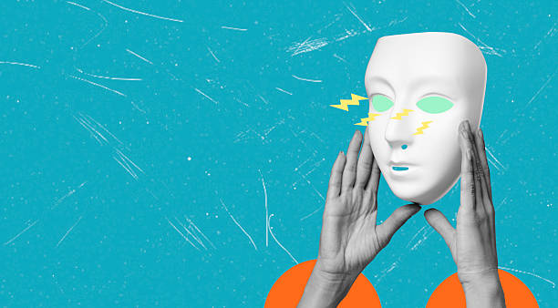 istock A modern artistic collage featuring the image of a theatrical mask held by a woman's hands. 2221639920