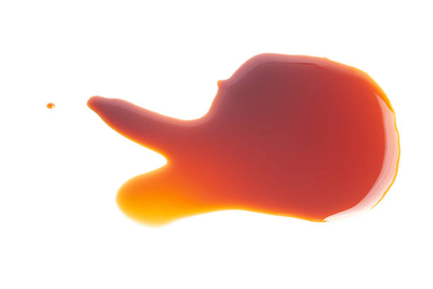 istock splashes of soy sauce isolated on white, top view 2221647862