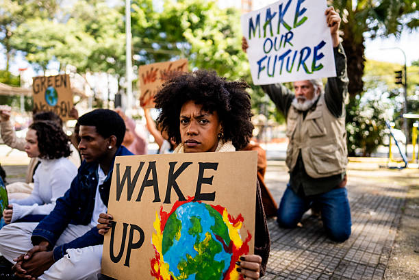istock Portrait of young environmentalist woman during protest 2221655895