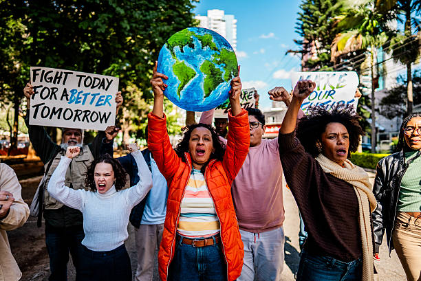 istock Environmentalists protesting at city street 2221656243