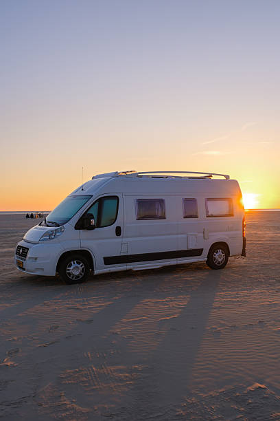 istock Enjoying a sunset by the beach in Denmark from a cozy camper van 2221659383