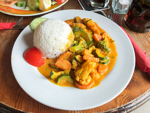 Vegetable scramble with rice timbale, typical Asian food