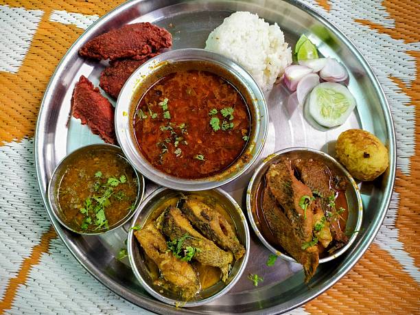 istock fresh fish dishes. Indian Thalis are considered nutritionally balanced meals. 2221683362