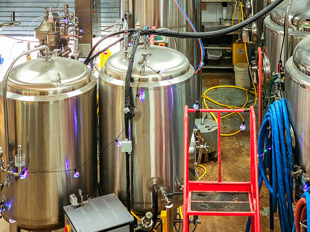 istock Metallic vats and equipment inside the microbrewery 2221687532