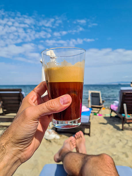 Drinking freddo espresso on the beach in Greece.