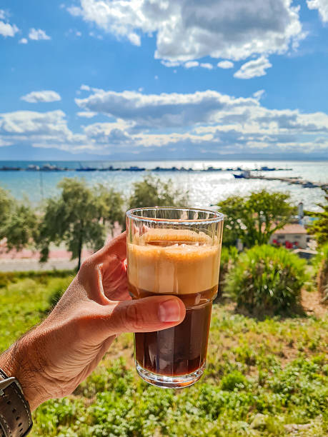 istock Drinking Freddo Espresso Near The Greek Coastline 2221689652