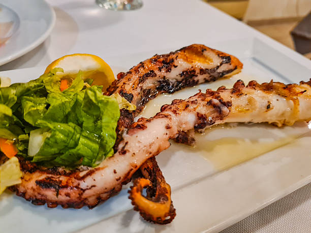 istock Grilled Octopus Tentacles On The Plate In A Restaurant 2221689828