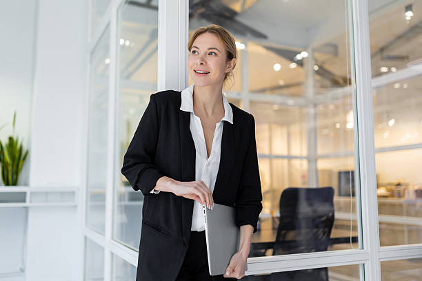 istock Good-looking female manager in the office looking confident 2221692386
