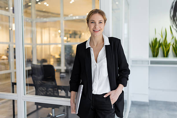 istock Good-looking female manager in the office looking confident 2221692397