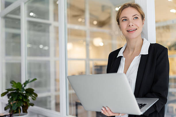 istock Good-looking female manager in the office looking confident 2221692409