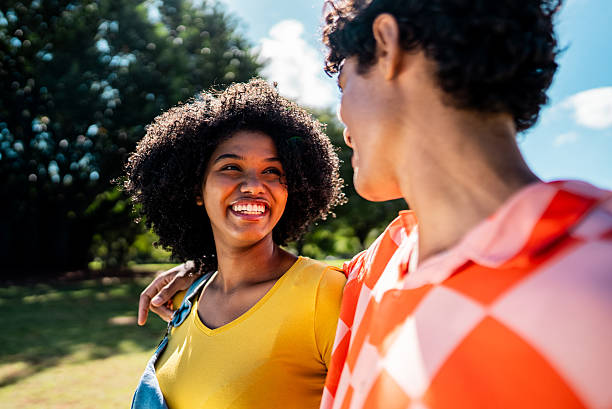 istock Young couple talking on public park 2221692985