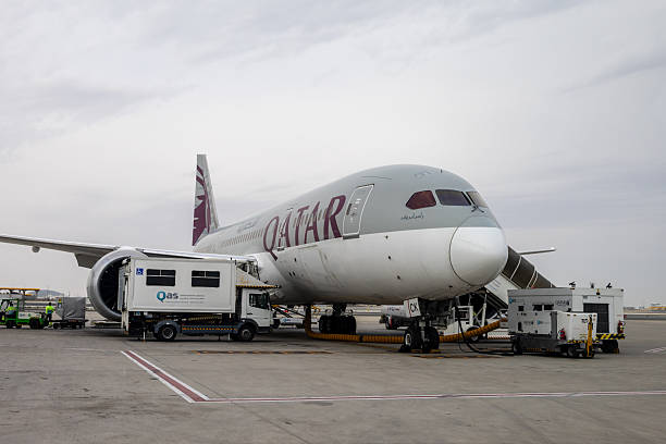 Doha, Qatar - February 24, 2025 : Qatar Airways Boeing 787-8 Dreamliner at Hamad International Airport in Doha, Qatar.