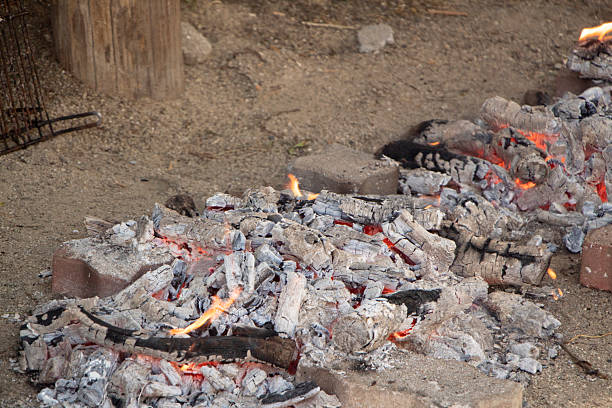 istock glowing embers of a barbecue 2221695761
