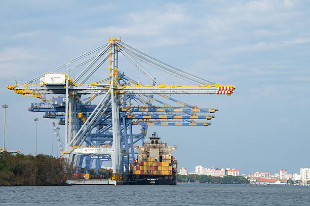 Industrial harbor for container ship in Kochi, India, cargo terminal, transport, import and export, Fort Kochi, Vasco da Gama beach, 20.03.2025