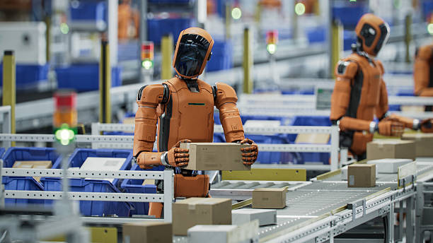 istock 3D Render: Autonomous AI-Enabled Humanoid Robot is Moving Boxes and Sorting Packages at Fulfillment Center. Automated Warehouse or Logistics Center with Working General Purpose Humanoid Robots 2221698892