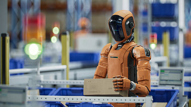 istock 3D Render: Autonomous AI-Enabled Humanoid Robot Works at Warehouse. He is Moving Boxes and Sorting Packages. Automated Fulfillment Center or Logistics Center with General Purpose Humanoid Robots 2221698907
