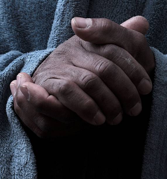 istock praying o God with hands together 2221700772