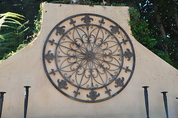 Decorative Floral Relief Panels on a White Wall